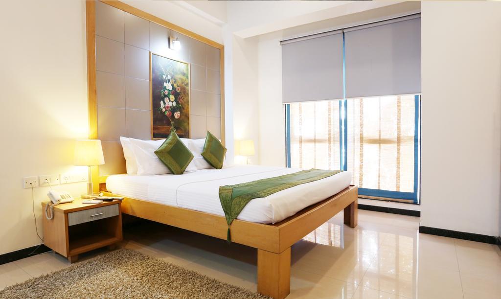 Treebo Edha Suites Koramangala Bangalore Buitenkant foto